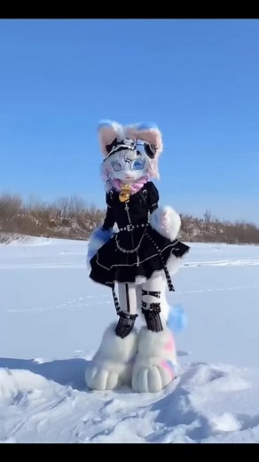 Furry Cosplay Performance in Snowy Landscape