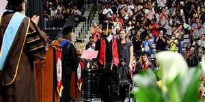 ‘Anything is possible’: Paralyzed student walks across graduation stage with robotic exoskeleton