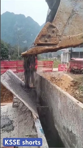Excavator-Assisted Concrete Pouring in Action 🤯🚧 #Construction #Engineering