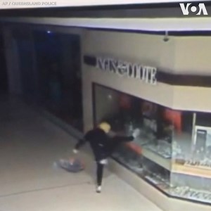 41K views · 224 reactions | Security footage released Sunday, May 5, captured a man wearing a Donald Trump mask robbing a number of stores near Brisbane, Australia. Police have appealed for help in finding the criminal. Footage shows the man smashing the window of a jeweler, stealing goods in an electronics store and stashing his loot in brown paper bags. Another video shows the mask slipping off the man’s head as he makes his escape. (AP) | Voice of America | Facebook