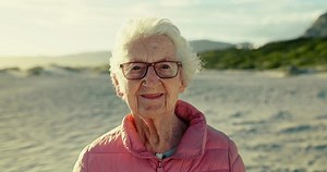 clip-3400366729-senior-woman-face-holiday-on-beach-smile