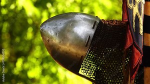 Medieval metal helmet with chain mail for battles on swords. Stock Video