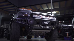 Cut to the chase with the all-new TJM Chaser Series bull bar. Packed with attitude and engineered to work and play hard. While the TJM Chaser is light weight at only 30kg (bar only), it is packed with features; - 63mm upper tube and 50mm lower tube - Integrated steel winch frame (to suit up to a 9,500lb synthetic winch) - Provisions for Dual aerials and driving lights - Reinforced T-slots for Hi-lift jacking - 8000kg Rated Recovery Points - Steel wing guards - Front underbody guard included - Bl