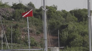Diving boat flying the Michigan diving flag in Antigua Caribbean