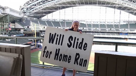 Ride Bernie Brewer's slide