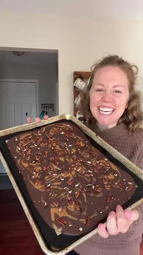 Turtle bark combines all those classic flavors of turtle candy, but it’s easier to make than individual little candies. With just 4 ingredients and no baking required, you’re going to love this yummy Christmas treat! Head to the link in the comments for the recipe! #blogger #food #foodblogger #dessert #michiganblogger #bakery #bakinggoals #ohmyyum #recipes #recipe #recipedeveloper #turtlebark #turtle #glutenfree #gf #christmas #holidays #candy #easyrecipe | The First Year