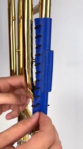 @mglw_official Trombone Leather Slide and Neck Guard Set Protect your trombone from wear and tear with our new Trombone Slide and Neck Guard Set, crafted from high-quality Capra leather. - Trombone Slide Guard: Shields both the inner and outer slide from sweat, dirt, and scratches. Easily secured with laces, available in 7 colors, and customizable with embossed symbols or characters. - Trombone Neck Guard: Protects the neck while extending the instrument’s lifespan. Features a built-in pencil ho