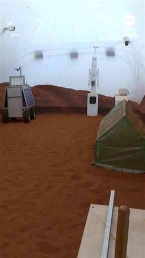 The crew of a NASA mission to Mars emerged from their craft after a yearlong voyage that never left Earth. The four volunteer crew members spent more than 12 months inside NASA's first simulated Mars environment at Johnson Space Center in Houston, coming out of the artificial alien enviroment Saturday around 5 p.m. The quartet lived and worked inside the space of 17,000 square feet to simulate a mission to the red planet, the fourth from the sun and a frequent focus of discussion among scientist