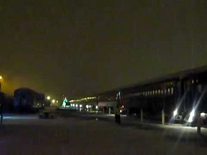 Grand Canyon Railway's POLAR EXPRESS arriving into Williams Arizona while Snowing