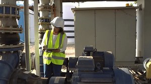 clip-1104103209-environmental-engineer-inspects-water-quality-treatment ...
