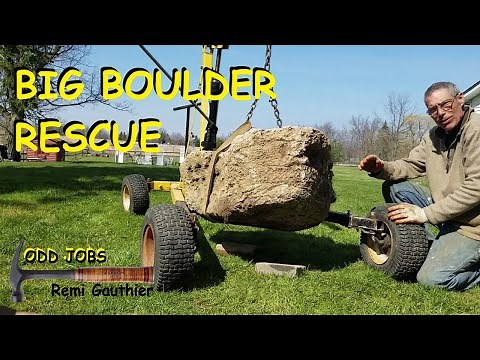 Moving large rocks by hand (using modified hoist)