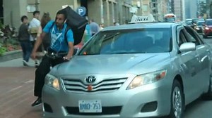 Toronto cab and bike courier collide on street