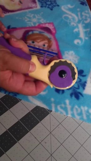Using a rotary blade to put holes in fleece