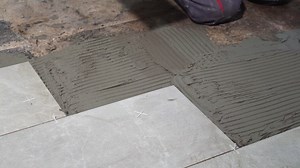 Laying Floor Tiles: A Step-by-Step Guide | Premium Stock Video Footage