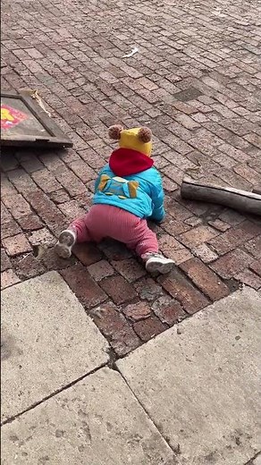 Child falls while jumping stairs then does a trick roll and gets up