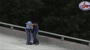 Off-Duty Cop Talks Man Off Bridge, Offers Hug