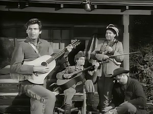 Fess Parker - The Ballad Of Davy Crockett (1954) "The Ballad of Davy Crockett," released in the mid-1950s, is an emblematic song of American folklore, encapsulating the adventurous spirit of the frontier. Celebrating the life of the legendary Davy Crockett, the song's catchy tune and vivid lyrics recount his exploits, from his birth in Tennessee to his heroism at the Alamo. Fess Parker's rendition, with his deep and resonant voice, was instrumental in popularizing the song, coinciding with his p