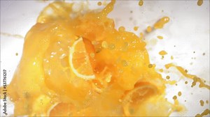 Super Slow Motion of Explosion Orange and Burst Juice and Slices