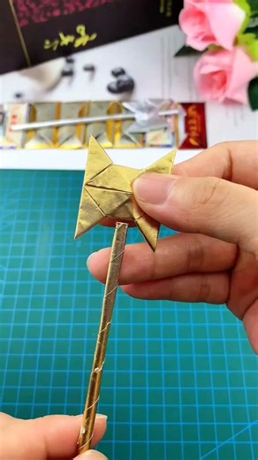 Origami axe #origamitutorial #handmadediy #diycrafts #upcycledcreation #childhoodcrafts #creativefolding #simpleorigami #funwithpaper #kidsdiy #origamiprojects @vlogger please subscribe My YouTube channel link in bio ND follow me on Instagram
