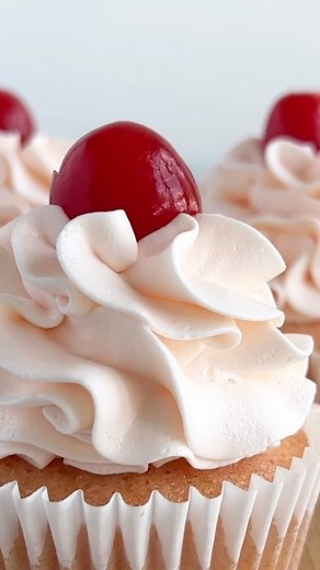 These cherry almond cupcakes are pretty in pink! Moist and fluffy with delicious cherry almond flavor, give these to your favorite Valentine, or keep them ALL to yourself! Recipe linked in my profile and on cakemehometonight.com! #cherry #almond #cupcakes #cupcake | Cake Me Home Tonight