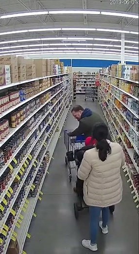 Heroic Moment Caught on CCTV: Shopper Prevents Shelf Collapse!