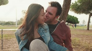 Couple in love spending time together in the park