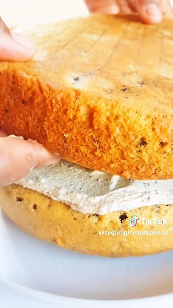 If you want the full tutorial and recipe on how to make the Oreo Layer Cake, visit my YouTube Channel Sugar, Spice & Rosé #cookiesandcream #oreocake #americanbuttercream oreo cake recipe, baking tutorial, cookies and cream cake, easy baking recipe