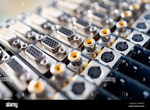 Close-up blurry metal sockets on a computer video board. Concept for the production of computer televisions and audio speakers Stock Photo - Alamy