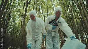 Forensic police investigators arriving at a crime scene and assessing the situation. Taping and marking the crime scene Stock Video