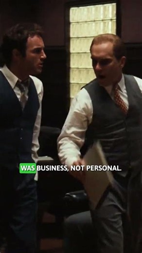 Sonny Corleone argues with Tom Hagen in The Godfather.