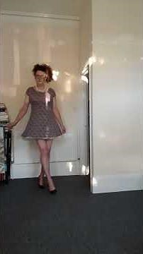 Sissy practising walking in four inch heels