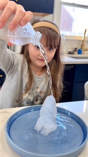 Kamry Vincent | Kentucky Creator on Instagram: "This Instant Ice science experiment was so much fun and super easy to do! My kids loved it! Share this fun idea with a mama! 😊 Supplies •Water bottle •Plate •Ice Steps 1)Place unopened bottled water into your freezer. 2)Leave in freezer for two hours. 3)Place your ice cubes on a plate and slowly pour the water onto the ice cube. 4)Have fun watching your ice tower form! 🧊 Here’s the science behind it! ⬇️ Instant ice is a fascinating demonstration 