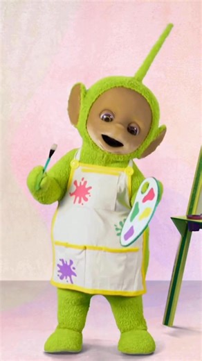 Which costume should Dipsy wear for Halloween? 💚✨ Video: Dipsy, the green Teletubby, playfully switches between three costumes: a singer, a movie star, and an artist. | Teletubbies