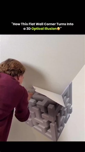 sci || tech || history on Instagram: "What looks like a massive 3D structure bending out of a building is actually a forced-perspective optical illusion created using wallpaper, not paint or print. This illusion belongs to a class called anamorphic wall illusions, where a pre-distorted image is applied to a completely flat surface. In this case, the image is installed as wallpaper panels, carefully aligned so that from one precise viewing angle, all the distorted lines snap into place and your b