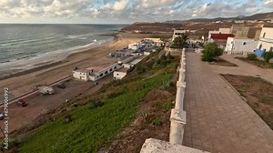 Sidi Ifni City Beach is a serene and picturesque coastal destination in southwestern Morocco. This beautiful beach offers golden sands, clear blue waters, and rugged cliffs