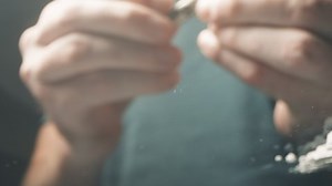 clip-1065468862-cocaine-junkie-snorting-line-coke-crushed-pills