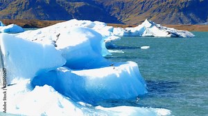 Jokulsarlon glacier and icebergs floating in the lagoon, one of the most touristic spots in Iceland.