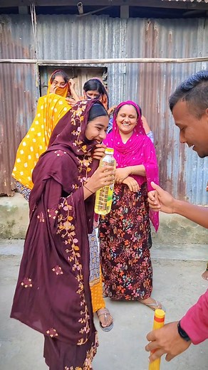 1.1M views · 9.4K reactions | who can hit the football to break the tower of oil bottle ? #shorts #GameChallenge #banglafoodchallenge #reelsvideo #KhelaHobe | Bangla Food Challenge | Facebook