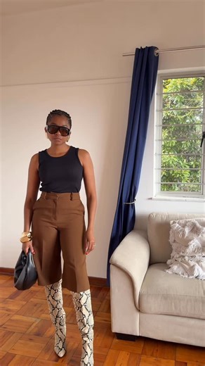 Andi James on Instagram: "I need to find more snake print boots. #southafrican #southafricanfashion"