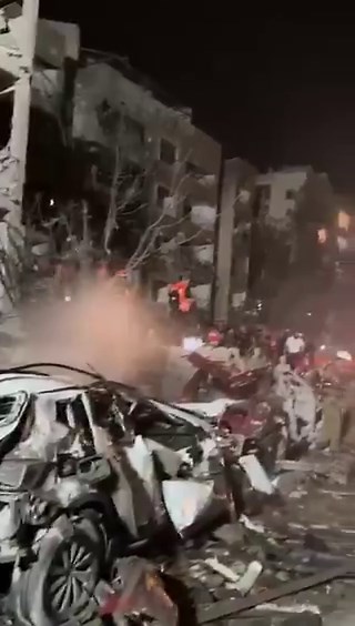 🇮🇱🇮🇷 Two cities. Same war.Tel Aviv digging through collapsed buildings after Iranian missiles.Isfahan engulfed in fireballs from coalition strikes on weapons depots.Neither side is stopping.
