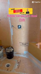 2.1K views | Installing Pebble floor tiles one at a time! #tileinstalltion #shorts #remodel #fyp #construction #tile | The Home Building and Remodeling Show | Facebook