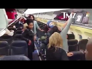 CASH ME OUTSIDE HOW BOW DAH GIRL GETS INTO FIGHT ON AIRPLANE! PUNCHES PASSENGER IN FACE!! FULL VIDEO