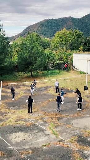 Outdoor Volleyball Game with Diverse Players