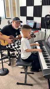 🌟 6 year old @Jelijah has a blast playing a lively Latin tune, Burrito Sabanero on the piano with his music mentor @americobaptistamusic 🎸 What's even more impressive? Jelijah learned the song by ear after hearing it on the radio during the car ride to Americo's studio! 🚗👂🏼 Watch as they create magic together, spreading holiday cheer through music! 🎹💙 | Jelijah Diaz Legacy