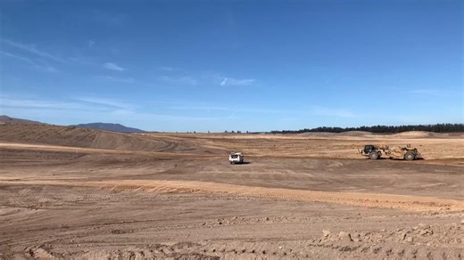 The real work starts before construction even begins. Before any concrete gets poured, the land has to be prepped. Scrapers are out moving dirt, leveling the ground and setting the stage for everything that comes next! Scrapers are known for their ability to cover large areas quickly, making them ideal for big site prep jobs like this one. They cut, load, haul and spread soil all in one motion, which keeps the job moving and the schedule on track. It’s tough work, but it’s the kind of work that 