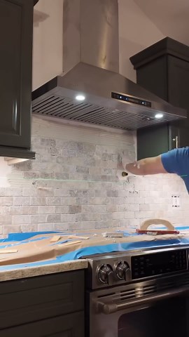 Finally finished tiling my kitchen backsplash