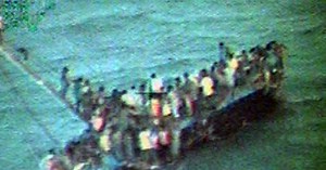 Dozens of Haitian migrants killed when overloaded boat capsizes