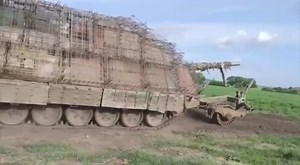 4.9K views · 129 reactions | Another Russian “turtle tank” with a mine trawl. | Military Updates | Facebook