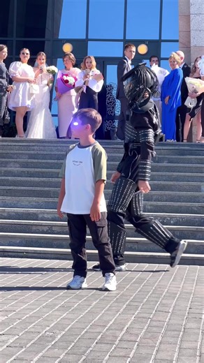 Teaching Neon Dance Moves to a Little Boy