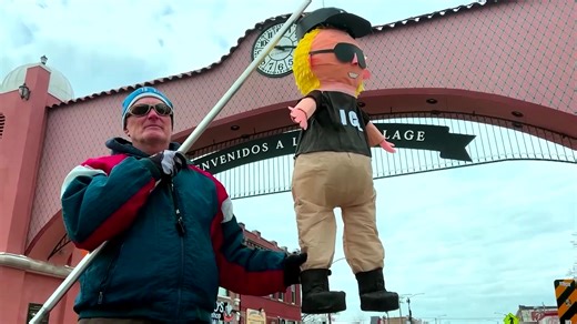A suburban Chicago man is drawing attention after raising a custom-made US Immigration and Customs Enforcement piñata during a protest | Reuters